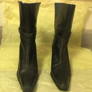 Black leather under the calf boots.